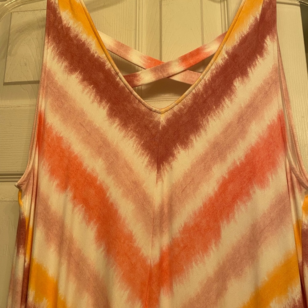 Soft knit knee length dress. Shades of coral.